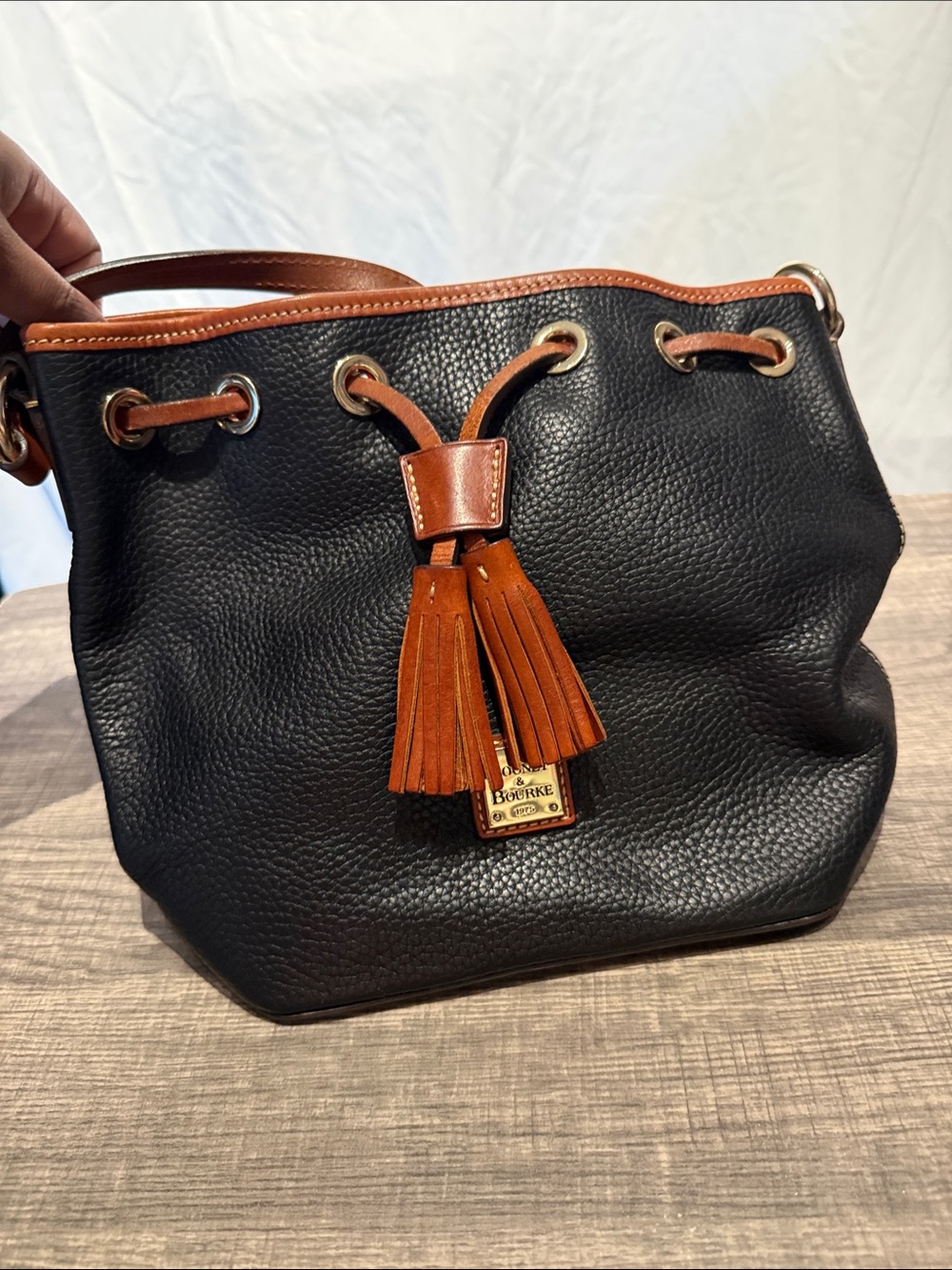 Dooney & Bourke Black Pebbled Leather Drawstring Shoulder Bag with Brown Trim